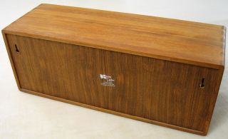This auction is for one (1) Kalmar Designs Teak Wood 30 CD