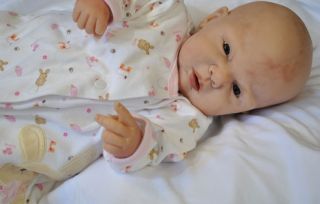 Kenna Simone is a petite newborn or large preemie at 19 long with a