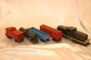Vintage Lionel O Scale One Steam Engine 027 and 4 Cars
