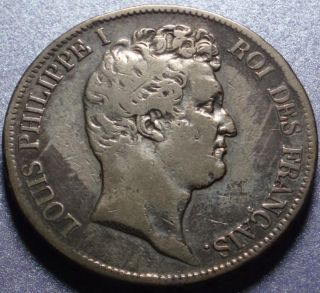 Louis Philippe right. Pierre Joseph Tiolier was the coin’s designer