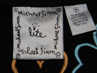 Description Michael Simon Lite long sleeve black knit cardigan with