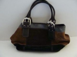bag goes with so many outfits. The Suede blocks are black, brown