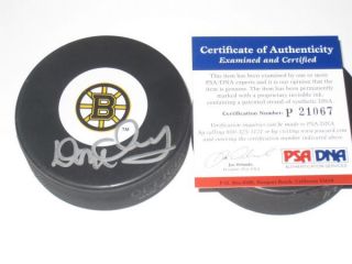 you are bidding on a hockey puck signed by don