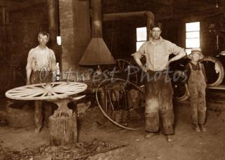 Blacksmith Black Smith Shop Making A Wagon Wheel Photo