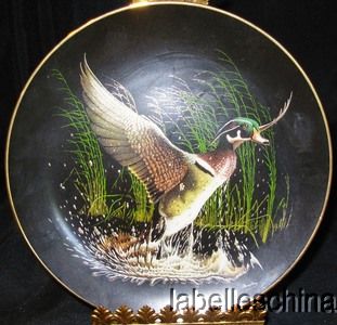 This beautiful WS George China Collector Plate is WINGED SPLENDOR