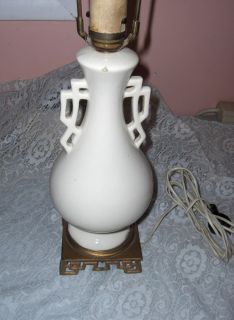 Up for sale is a beautiful white porcelain 1940’s table lamp (25