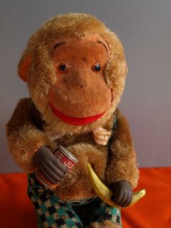 Battery Toys Picnic Monkey Blechspielzeug essender Affe