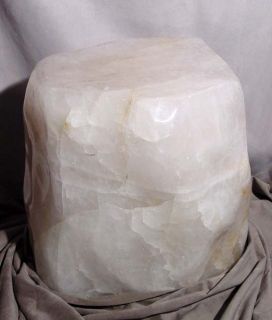 This polished crystal is made of milky white Quartz and can be used as