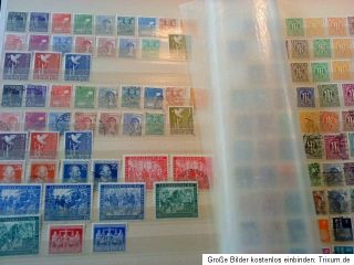 Umfangreiche Briefmarken und Ansichtskartensammlung in Alben/Tüten